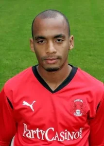 Elliot Omozusi